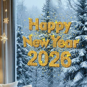 Nahaufnahme vom goldenen Happy New Year 2026 Fensteraufkleber vor verschneiter Kulisse