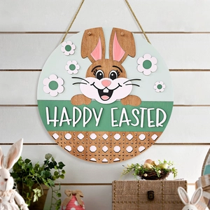 Round wooden Happy Easter door sign with cartoon bunny and flowers on a white wood wall