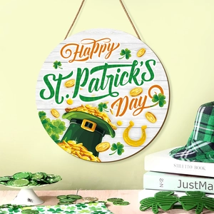 Detail of St. Patrick's Day round wooden sign featuring green hat, coins and shamrock