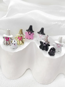 Detail of Halloween ghost charms for DIY jewelry making in assorted glossy finishes