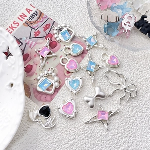 Y2K style DIY jewelry charms with pink and blue iridescent stones in silver alloy metal