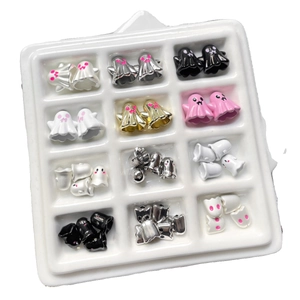 Colorful Halloween ghost charms in various metallic finishes displayed in a grid tray