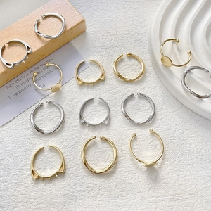Adjustable 14k gold plated pearl ring bases in minimalist wave and cat ear designs