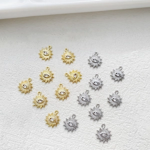 14k gold plated evil eye charms with starburst design and cubic zirconia for DIY jewelry