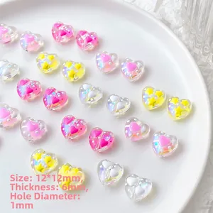 Macro view of 12mm colorful heart beads with star details and 1mm hole for DIY jewelry
