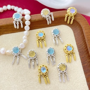 Silver and gold dreamcatcher pendants with moonstone and feather tassels for jewelry making
