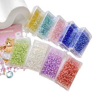 3mm glass cat-eye seed beads set in 9 colors with a clear plastic organizer box
