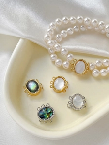 Detail of gold and silver magnetic pearl clasps for multi-strand jewelry designs
