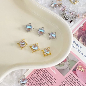 Gold and silver heart planet pendants with moonstone inlay for DIY jewelry crafting