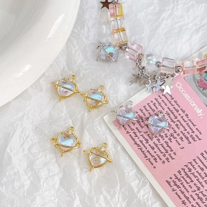 Golden and silver heart planet charms with moonstone inlay for jewelry making
