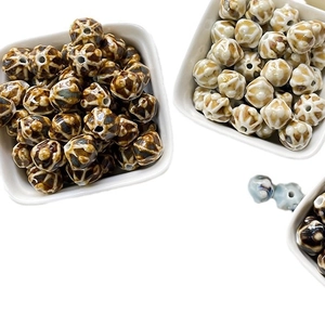 Handmade ceramic beads with giraffe print pattern for DIY jewelry making and bracelets