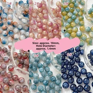 Dettaglio di perline di vetro cracklé da 10mm in sei colori per gioielli fai-da-te