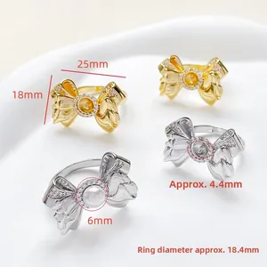 Detailed view of 18k gold plated bow ring base with cubic zirconia for DIY pearl setting
