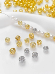 Detailed view of 14k gold plated hollow mesh beads used in pearl jewelry DIY