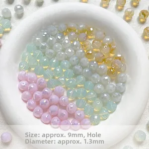 Macro shot of 9mm colorful faceted glass beads with a 1.3mm hole for DIY jewelry making