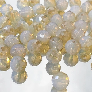 Close-up of 9mm faceted iridescent glass beads with AB coating for DIY jewelry making