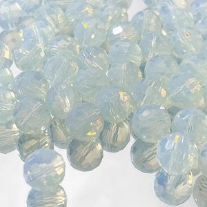 Macro view of 9mm light blue faceted glass spacer beads for DIY jewelry making