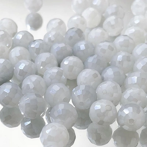 Macro shot of 9mm faceted milky white glass beads for DIY jewelry making and bracelets