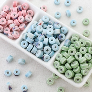 Flat round ceramic beads in pink, blue and green colors for DIY jewelry making