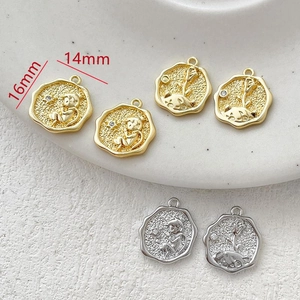 Macro detail of 14k gold-plated Little Prince pendant showing 16mm height and 14mm width