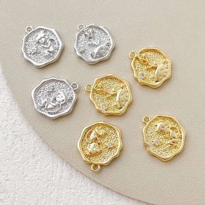 Detail of 14k gold-plated Little Prince relief charms for DIY jewelry making