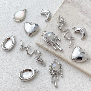 Silver alloy planet heart pendants collection for DIY jewelry making and craft supplies