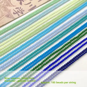 Détail de perles de 2mm multicolores pour bijoux DIY avec trou de 0,5mm