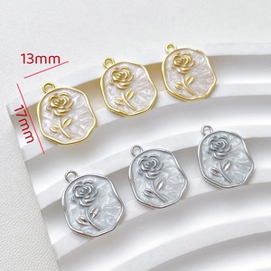Detail of 13x17mm oval rose pendant with pearlescent center for DIY jewelry making