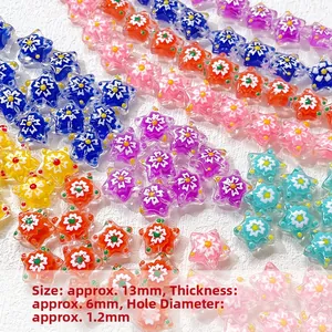 Detailed macro view of 13mm handmade star glass beads showing dimensions and 1.2mm hole