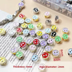 Macro shot of 8mm colorful enamel smiley face beads for DIY jewelry making accessories