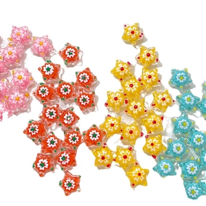 Hand-painted glass star beads with flower patterns for DIY jewelry making and crafts