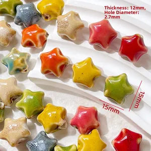 Macro detail of 15mm ceramic star beads with glaze finish and a 2.7mm center hole