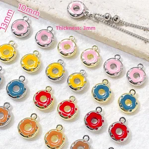 Detailed size view of colorful donut pendants for DIY jewelry with 13mm height and 10mm width