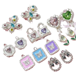 Silver alloy charms set featuring crystal hearts, butterflies and tulips for DIY jewelry