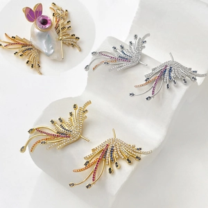 Baroque pearl ghost wings brooch with colorful zircon and gold plating details