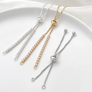 Adjustable 14k gold plated box chain extension with silicone slide bead and zircon stones