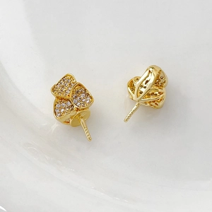 Detail of gold-plated zircon floral earring studs for DIY baroque pearl jewelry