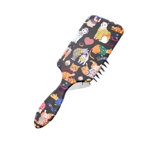Kids air cushion hair brush featuring cartoon cat prints and ergonomic handle with hole