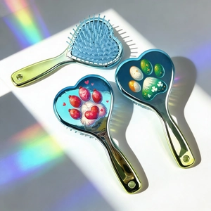 Mini heart-shaped air cushion hair brushes with metallic gradient and cat paw design