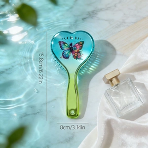 Heart-shaped air cushion hairbrush with butterfly floral print and moon phase design