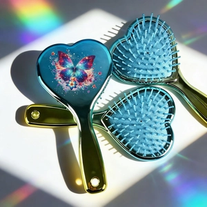 Brosse à cheveux cœur dégradé arc-en-ciel avec imprimé papillon et picots de massage