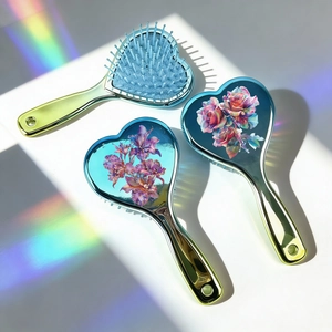 Electroplated heart-shaped cushion hairbrush set with vibrant floral patterns and rainbow finish