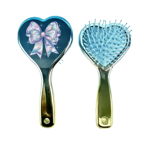 Blue heart-shaped air cushion hairbrush featuring a dreamy metallic bow illustration