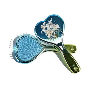 Gradient blue heart-shaped air cushion hairbrush with elegant white lily floral pattern