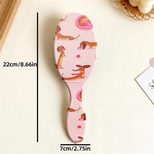 Brosse à cheveux ovale rose avec motifs de teckel et poignée ergonomique design