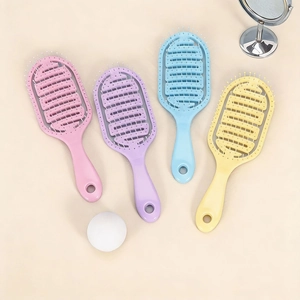 Set of four professional pastel vented hairbrushes for scalp massage and hair styling