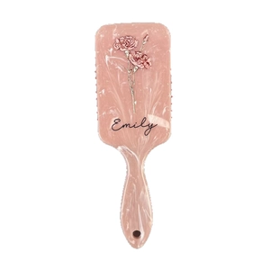 Pink marble cushion hairbrush with floral pattern and personalized name engraving