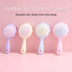 Brosses à cheveux mignonnes en forme de fleur avec coussin d'air pour massage du cuir chevelu