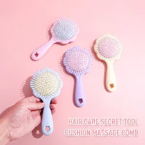 Brosses à cheveux mignons en forme de pétale avec coussin d'air et couleurs pastel