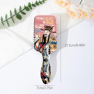 Pink air cushion hairbrush with cute God of Wealth illustration and size 21.5x7cm